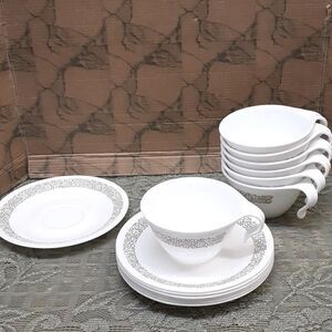 14 pc Corelle " Woodland" cups and saucers set.